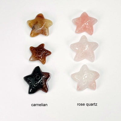 carnelian starfish next to the rose quartz starfish 