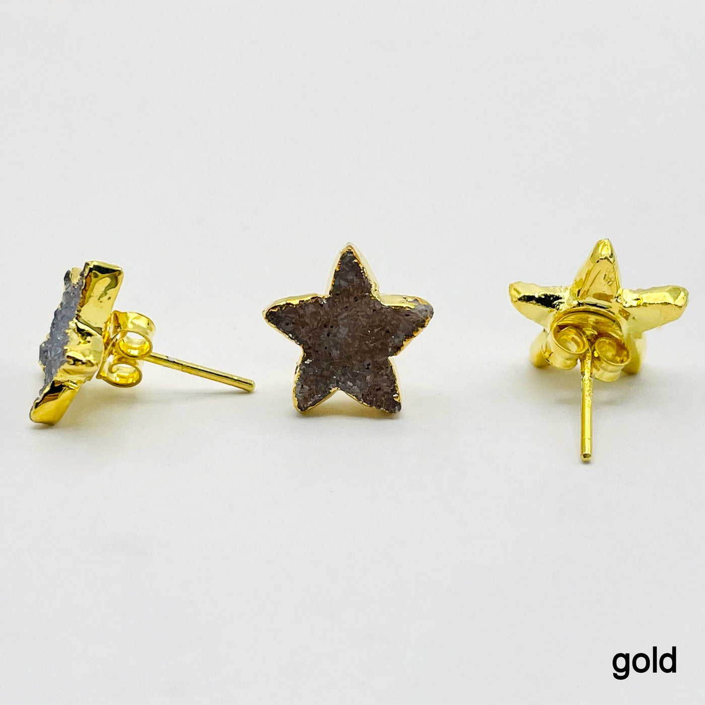 three gold natural druzy star stud earrings on white background for side, front, and back view
