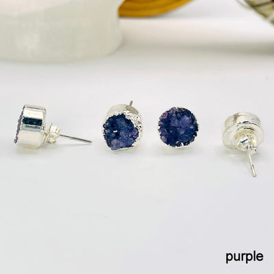 close up of four purple round druzy stud earrings for side, front, and back view