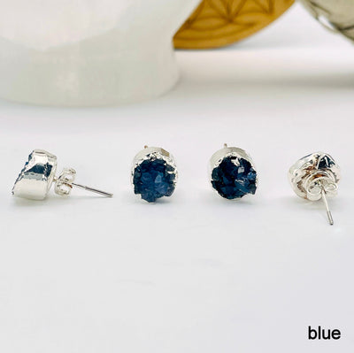 close up of four blue round druzy stud earrings for side, front, and back view