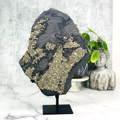 Frontside of the Pyrite with Basalt on metal stand