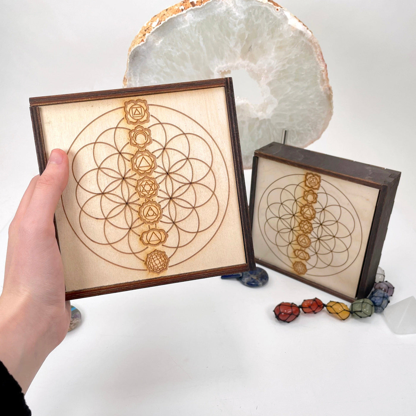 flower of life with seven chakra wooden storage box in hand for size reference