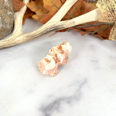 bottom view of vanadinite cluster on a white marble background