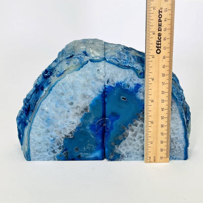 blue agate bookend next to a ruler