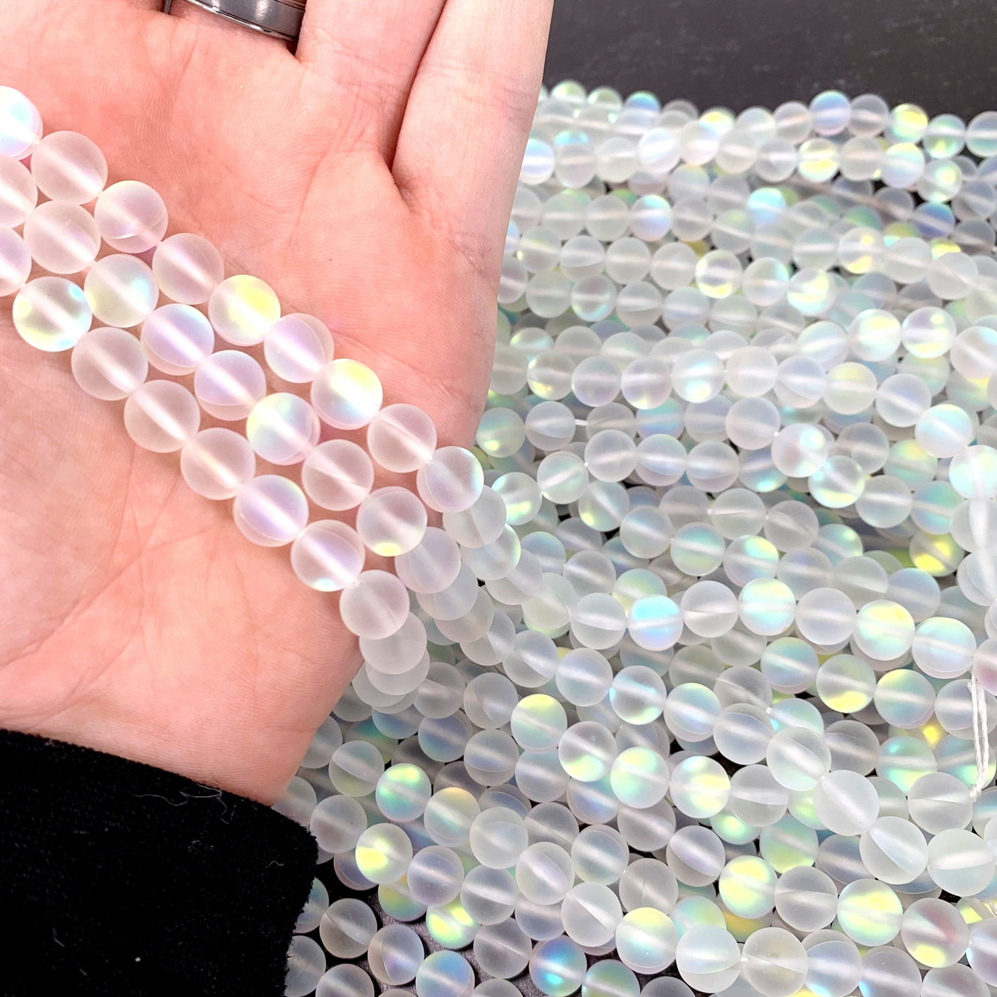 Opalite Polished Beads - 3 strands in a hand
