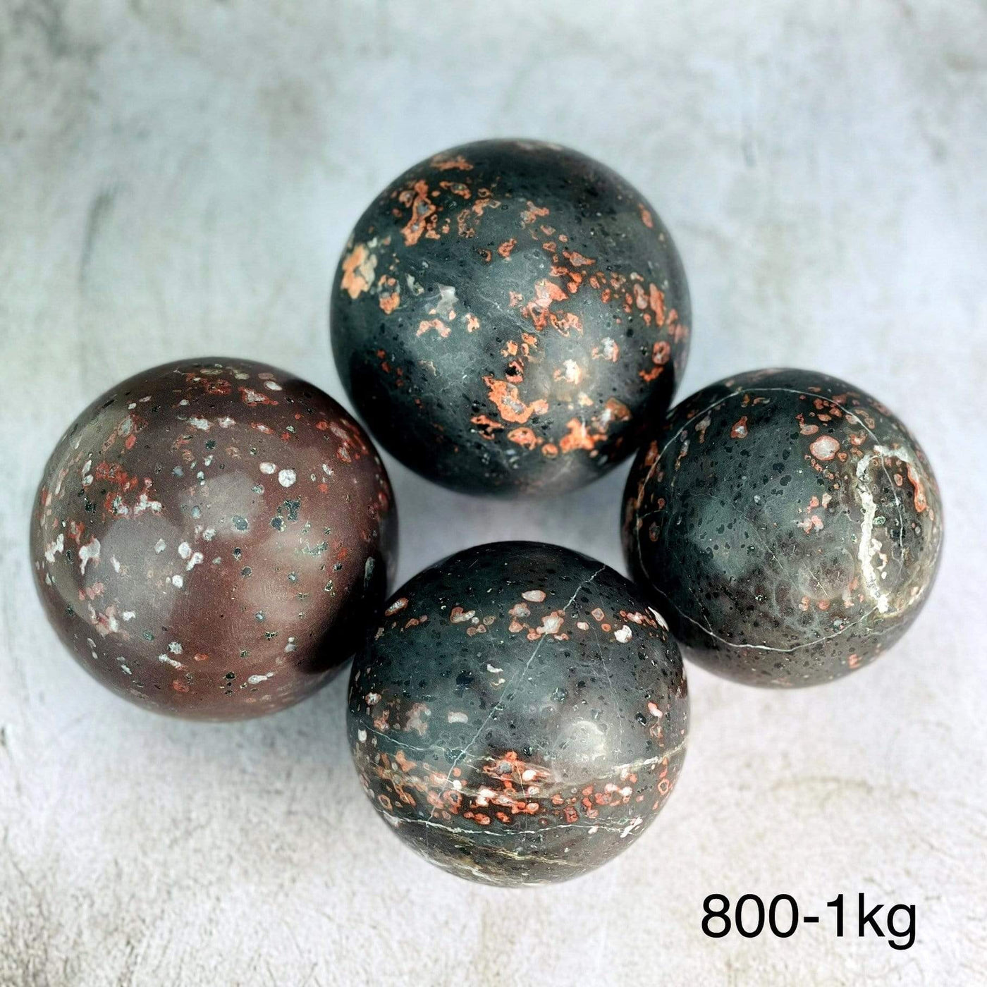 4 800-1kg plum blossom jasper stone spheres on gray background