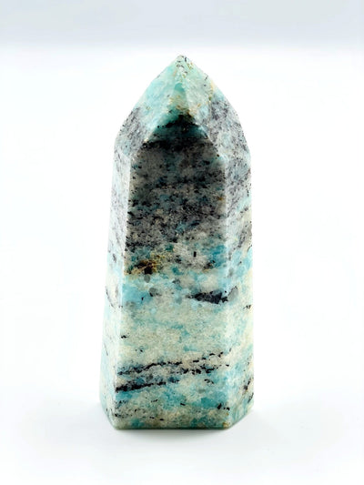 amazonite point being displayed on a white background. 
