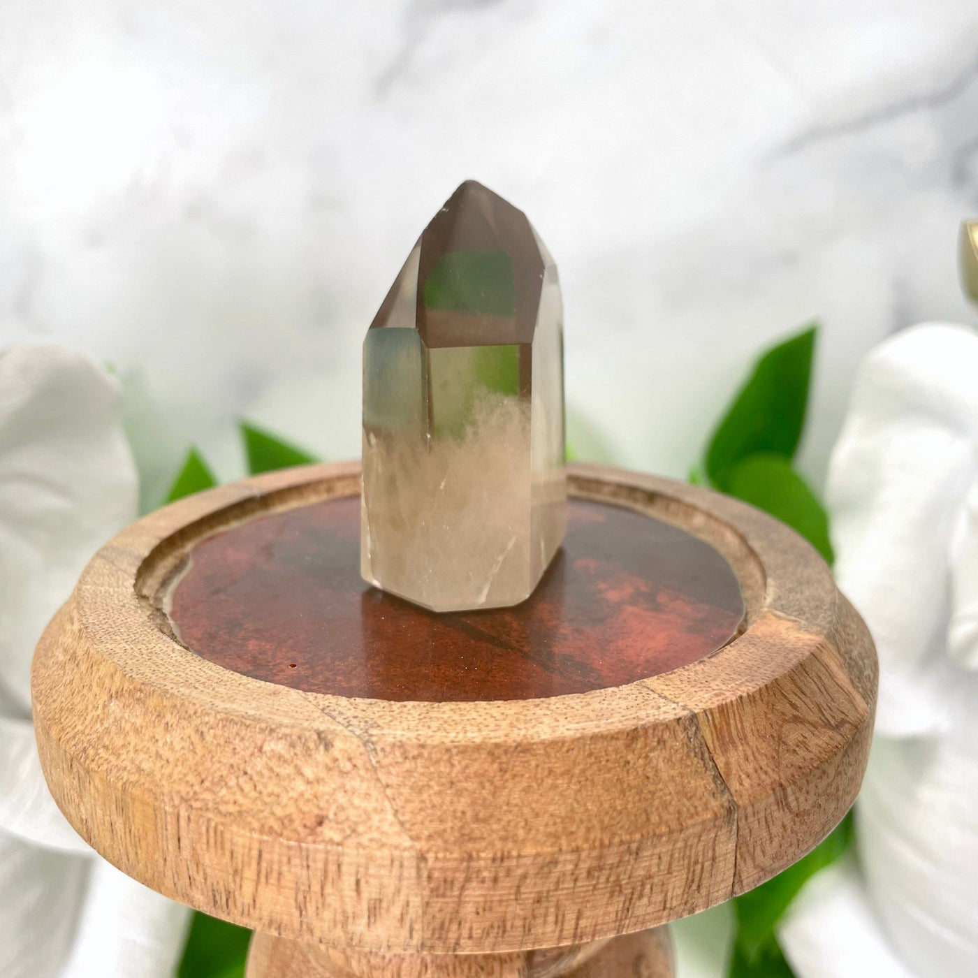 side view of smoky quartz polished point for thickness