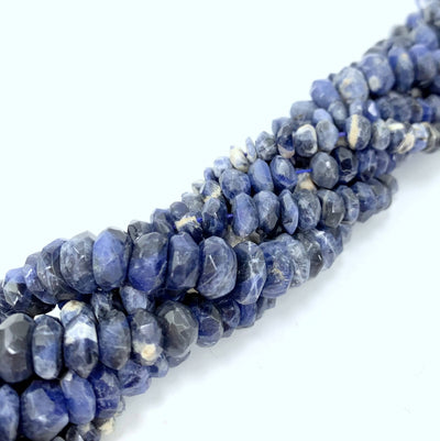 both sodalite variations twisted together on a white background