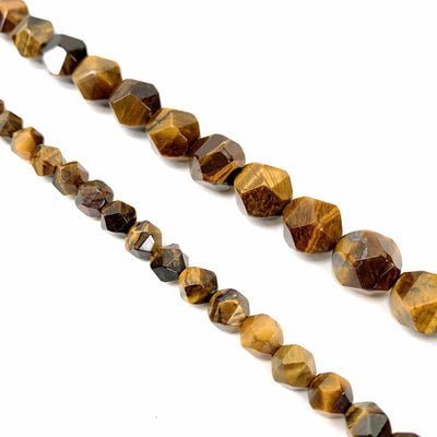 Faceted Pentadecagon Tiger Eye Beads ( left small, right large) on a white background