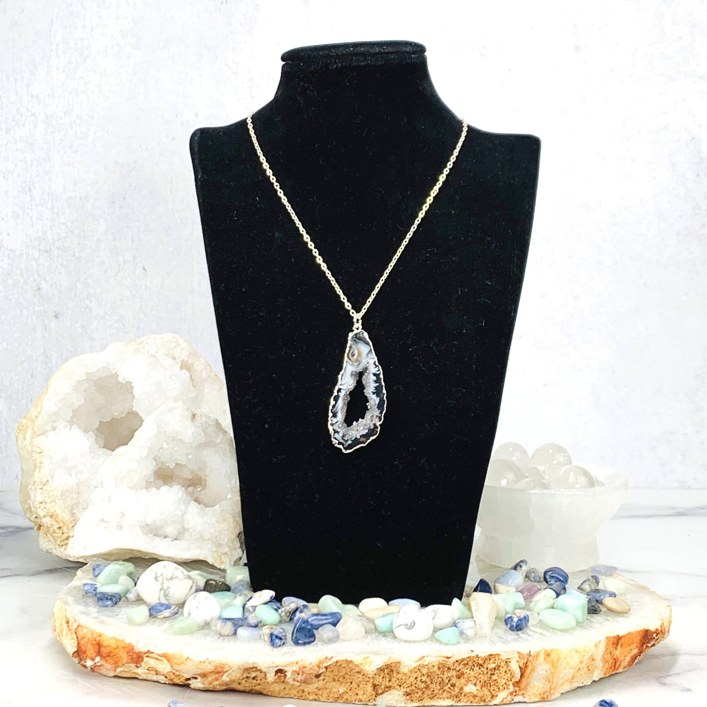Agate Druzy Slice Pendant with Electroplated Silver Edge displayed on mannequin