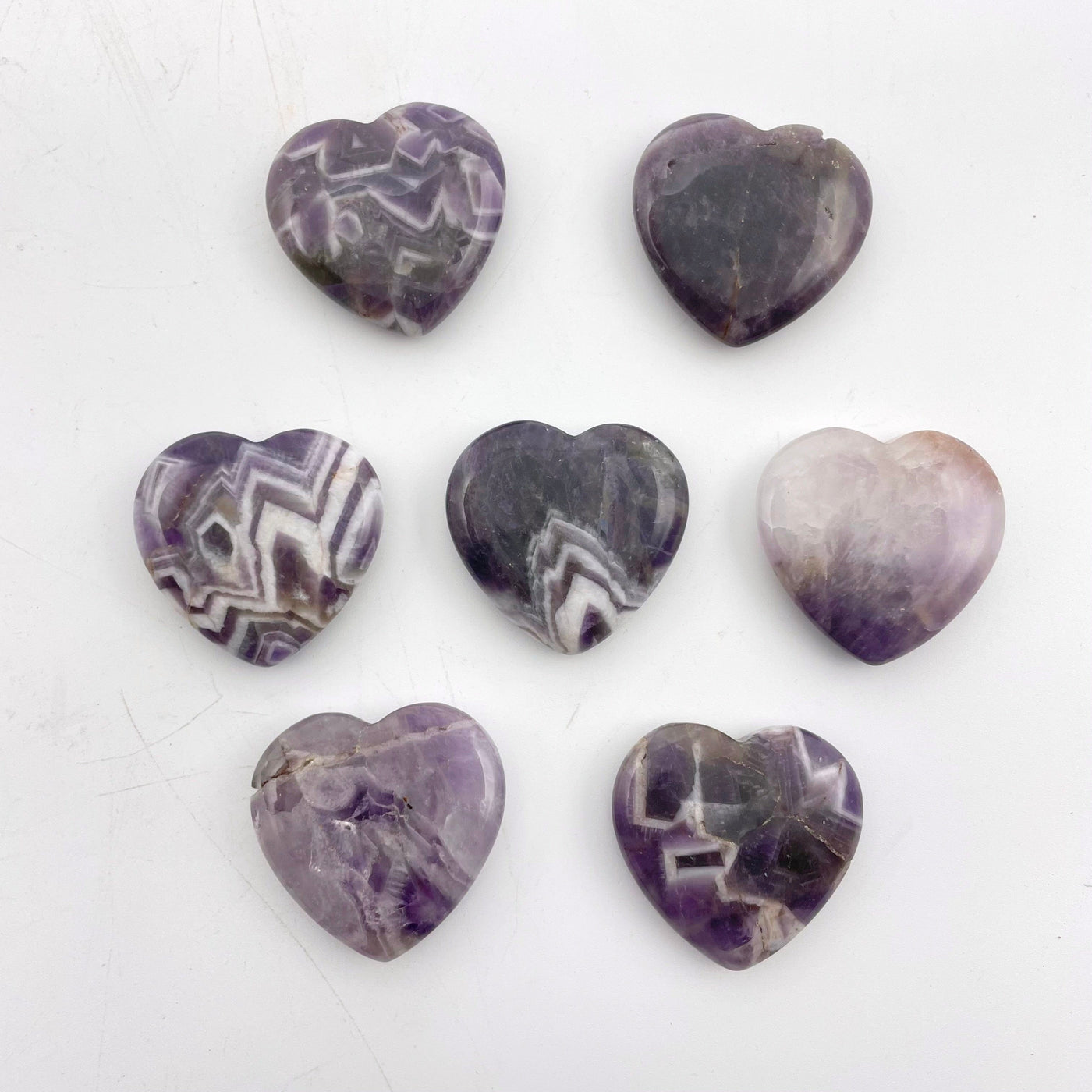 chevron amethyst polished hearts laying flat for possible characteristics 