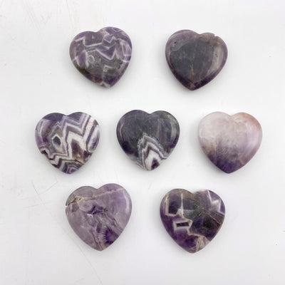 chevron amethyst polished hearts laying flat for possible characteristics 