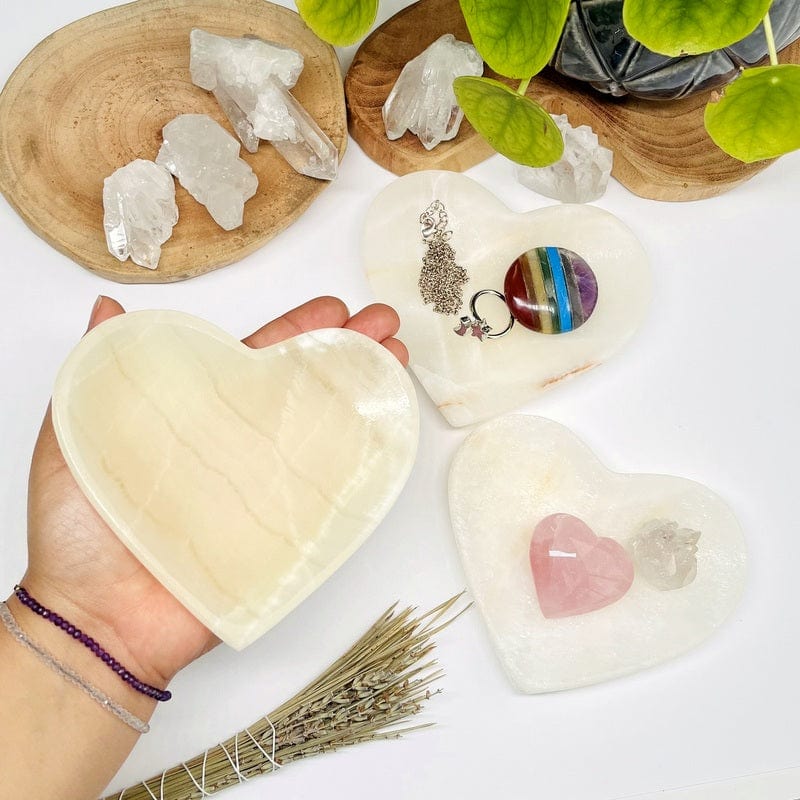 light onyx heart bowl in hand for size reference 