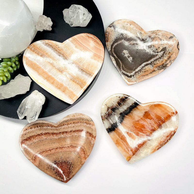 multi-colored mexican onyx heart bowls displayed as home decor 