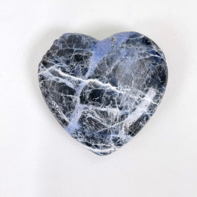 close up of chipped sodalite polished heart for possible damage