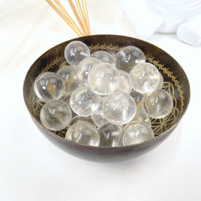 close up of crystal quartz spheres in bowl (bowl not included with purchase)