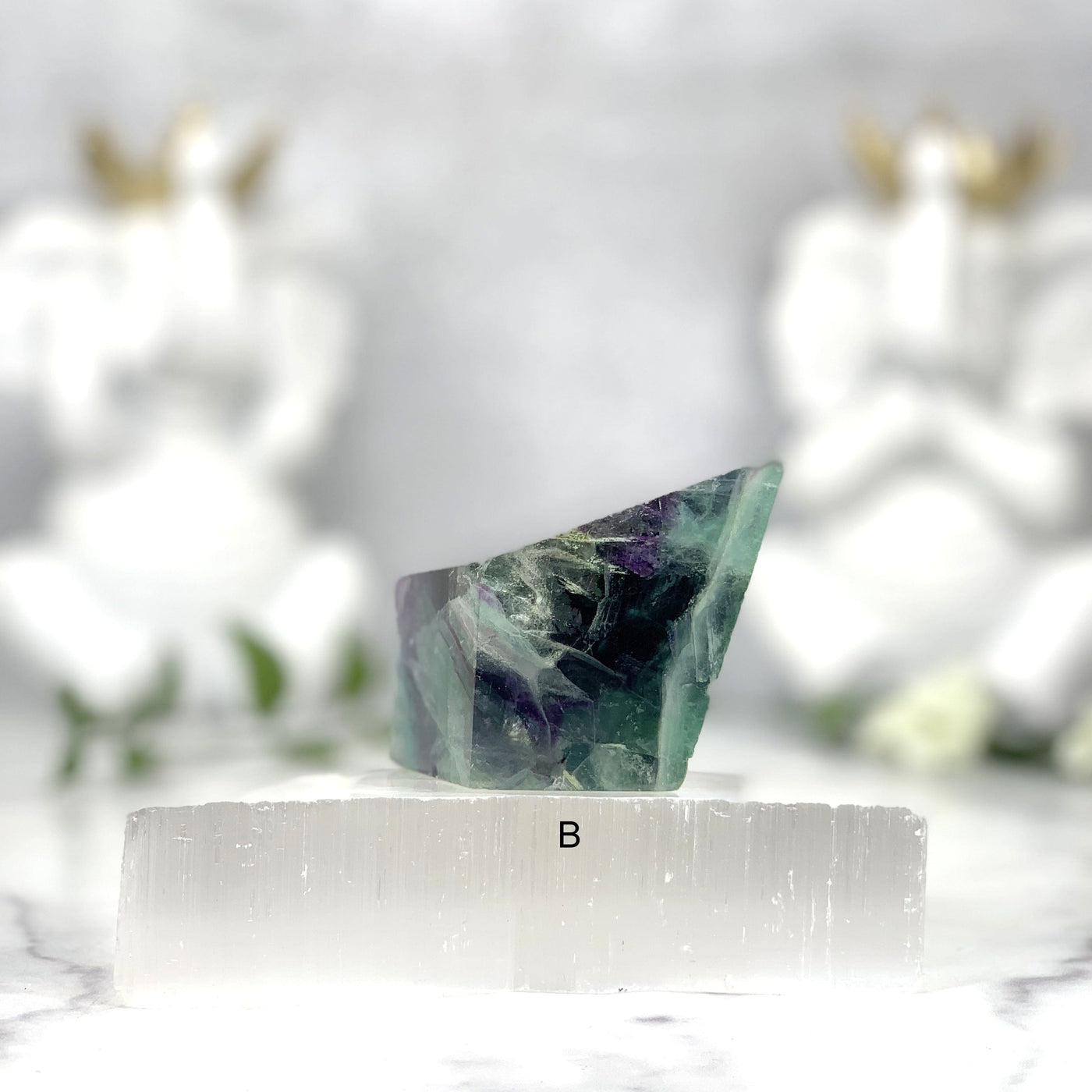 Side angle of the (B) Fluorite Chunks on white background