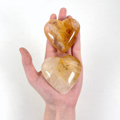 all golden healer polished heart options in hand for size options