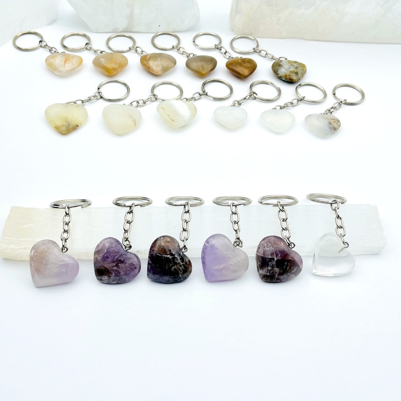 amethyst heart keychain displayed to show variations in color and size