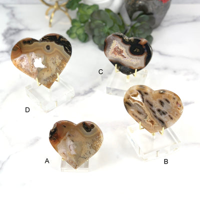 All 4 natural agate heart on acrylic stand. (A,B.C and D)