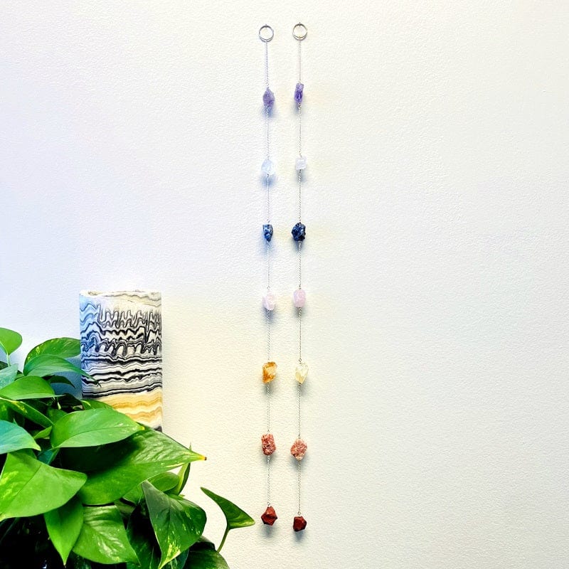 gold and silver chakra wall hangers displayed as home decor 