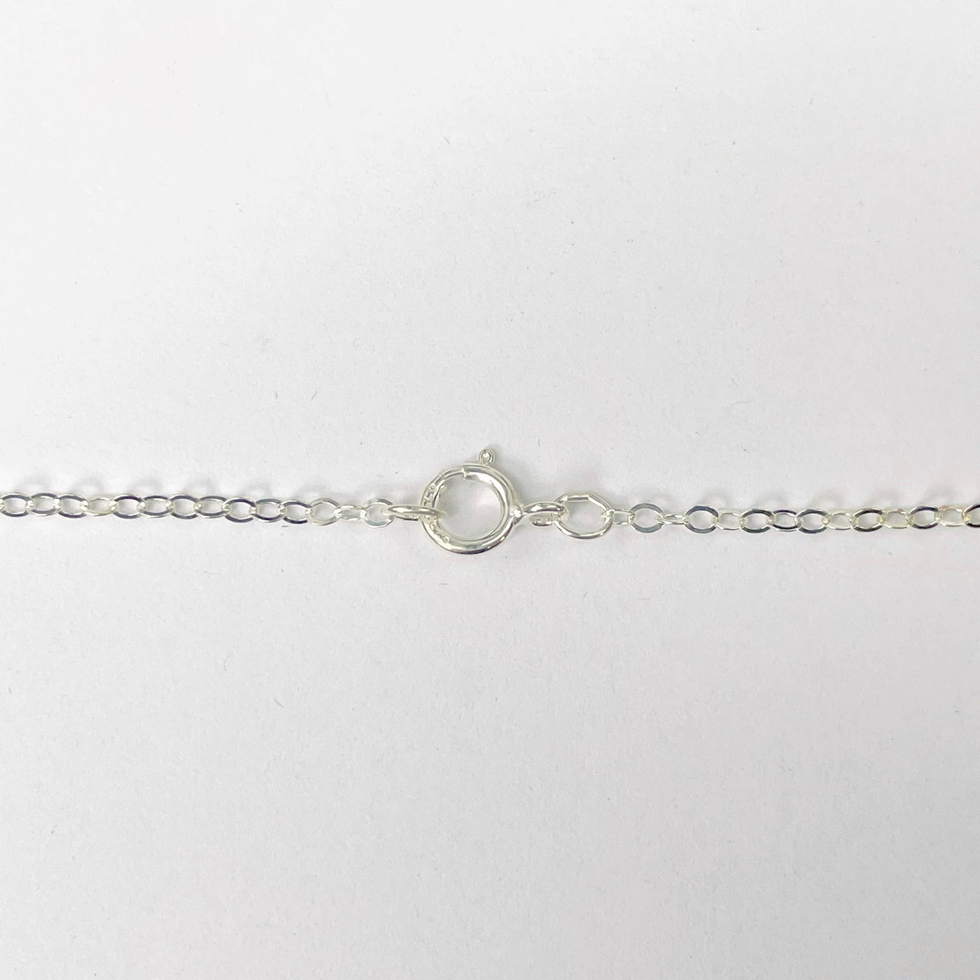 close up of sterling silver chain and clasp