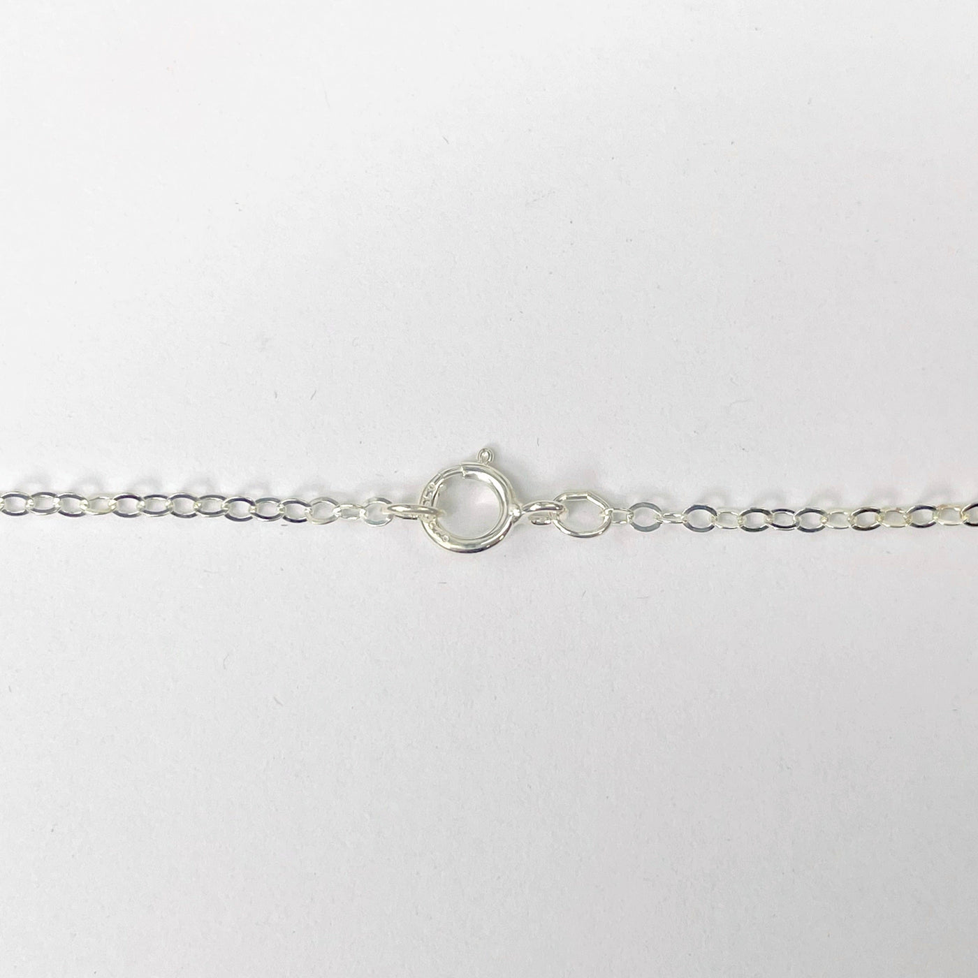 close up of sterling silver chain and clasp 