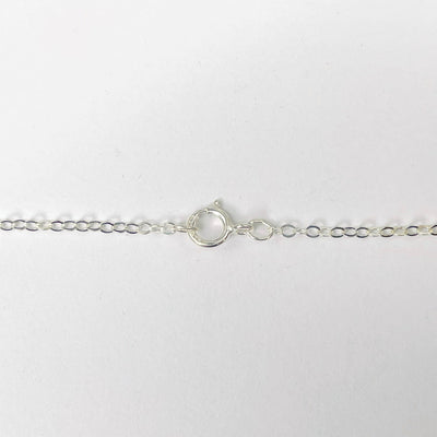 close up of sterling silver chain and clasp 