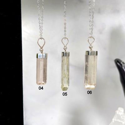 close up of kunzite necklace options 04 05 06