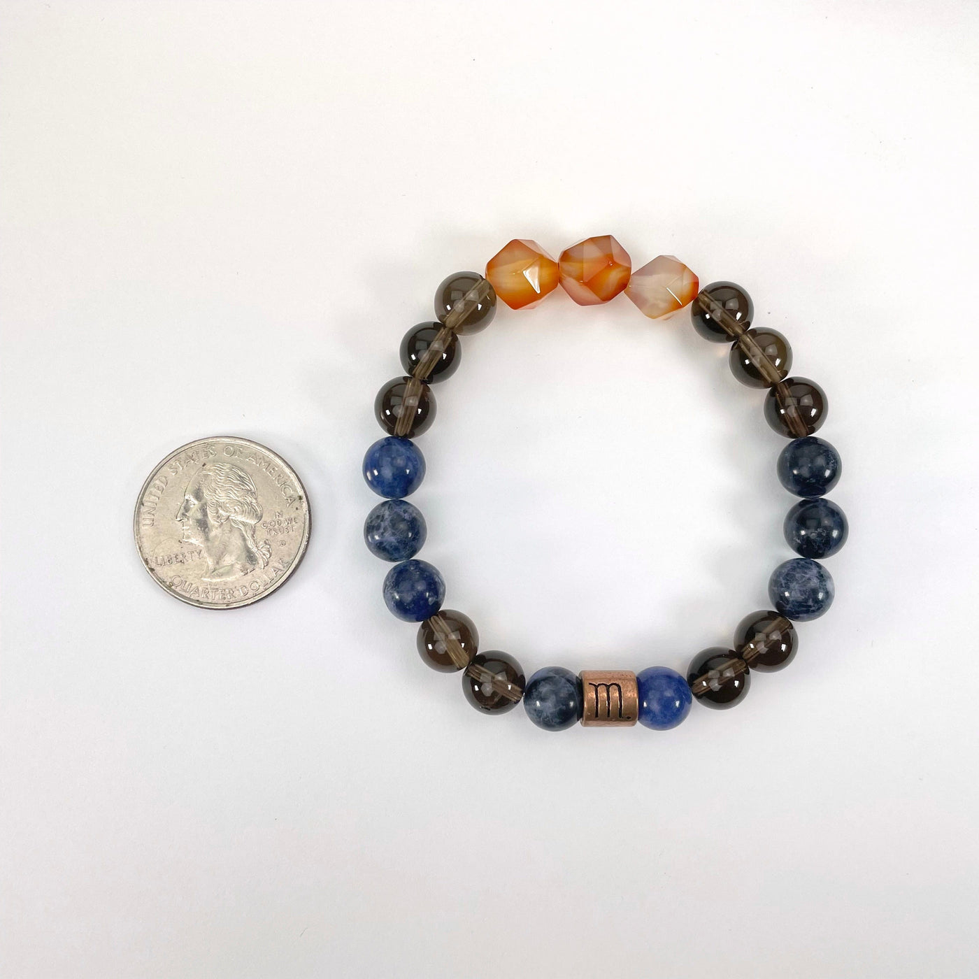 scorpio zodiac bracelet with quarter for size reference