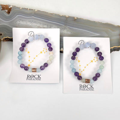 packaged pisces zodiac bracelets on display