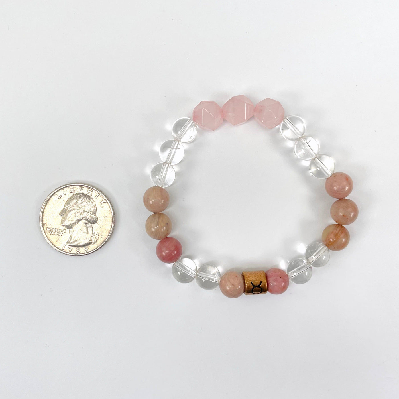 taurus zodiac bracelet with quarter for size reference
