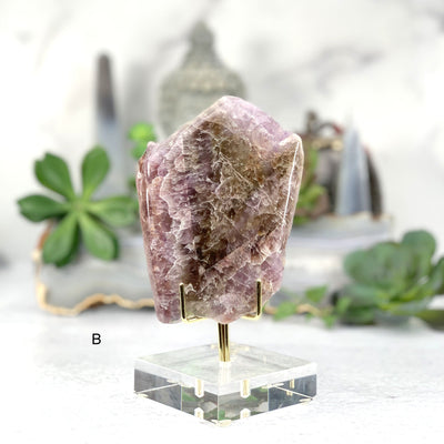 (B) Frontside of the purple Seven Mineral Slab on acrylic stand