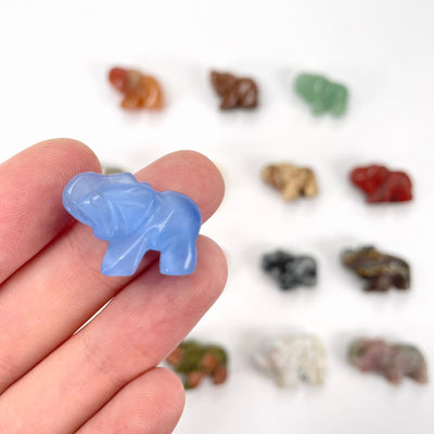 gemstone elephant in hand and on display