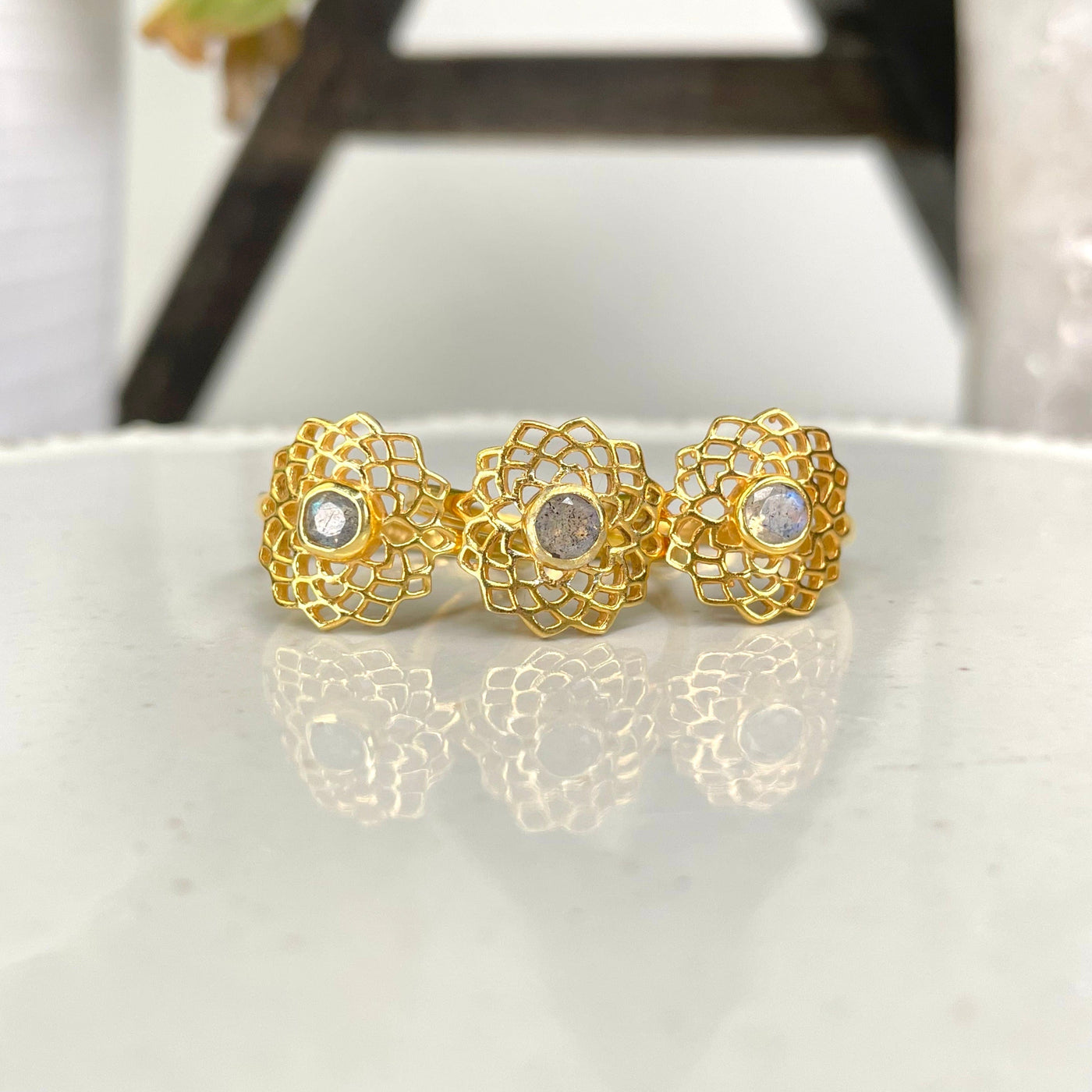 gold crown chakra rings on display