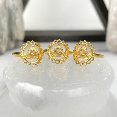 gold solar plexus chakra rings on display