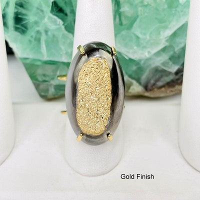 mystic oval druzy adjustable ring with a gold finish 