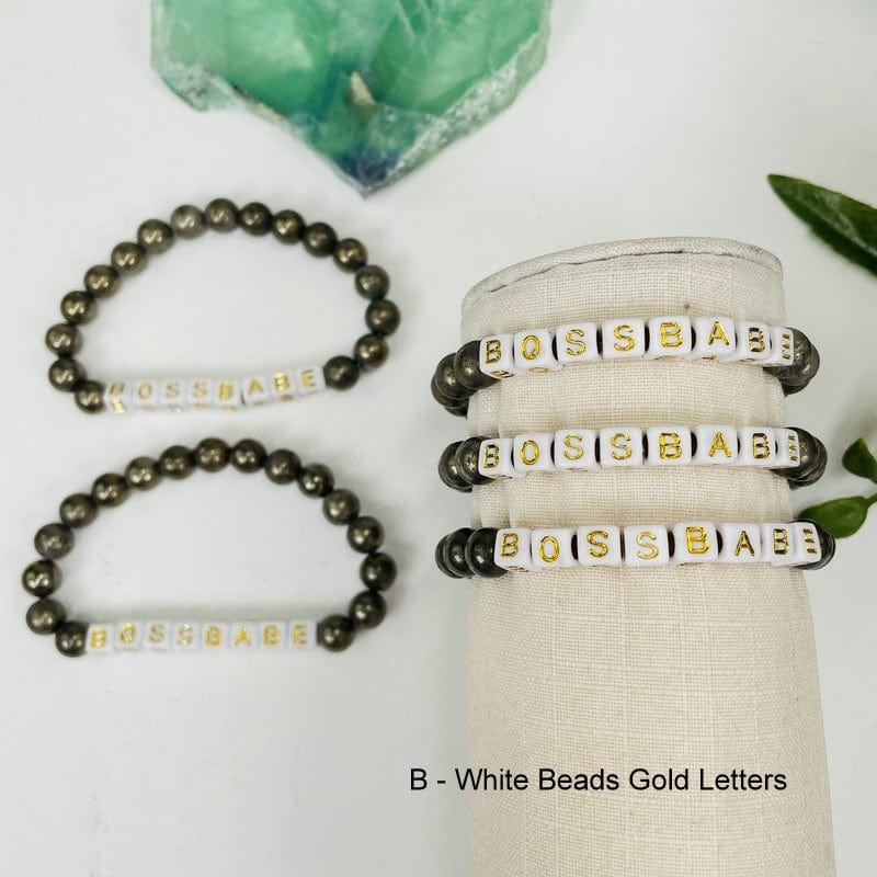 pyrite round bead bracelets with white square beads that spell out BOSSBABE in gold