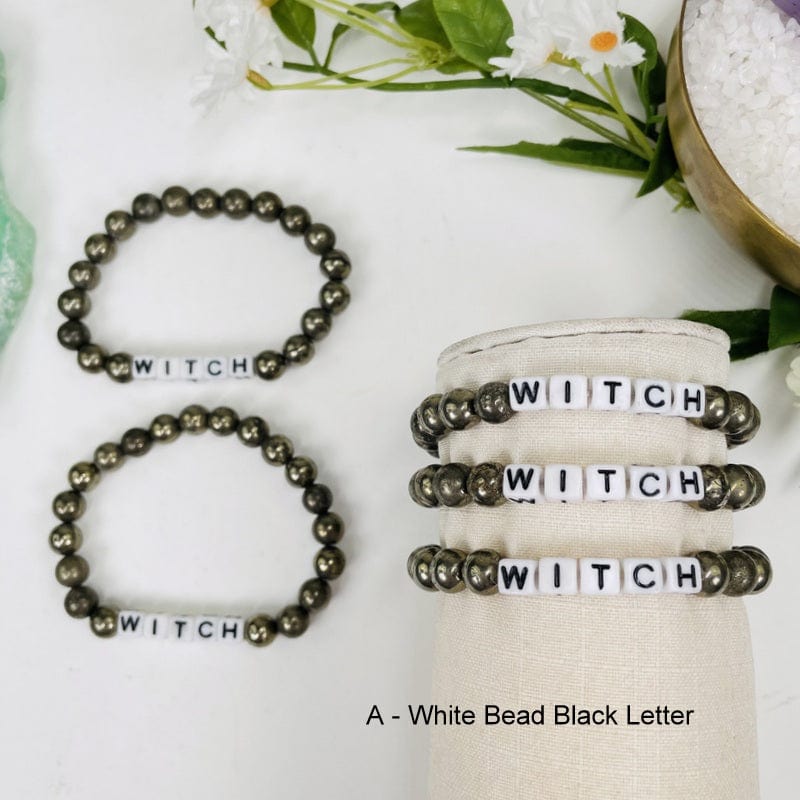 pyrite round bead bracelets with white square beads that spell out WITCH in black 