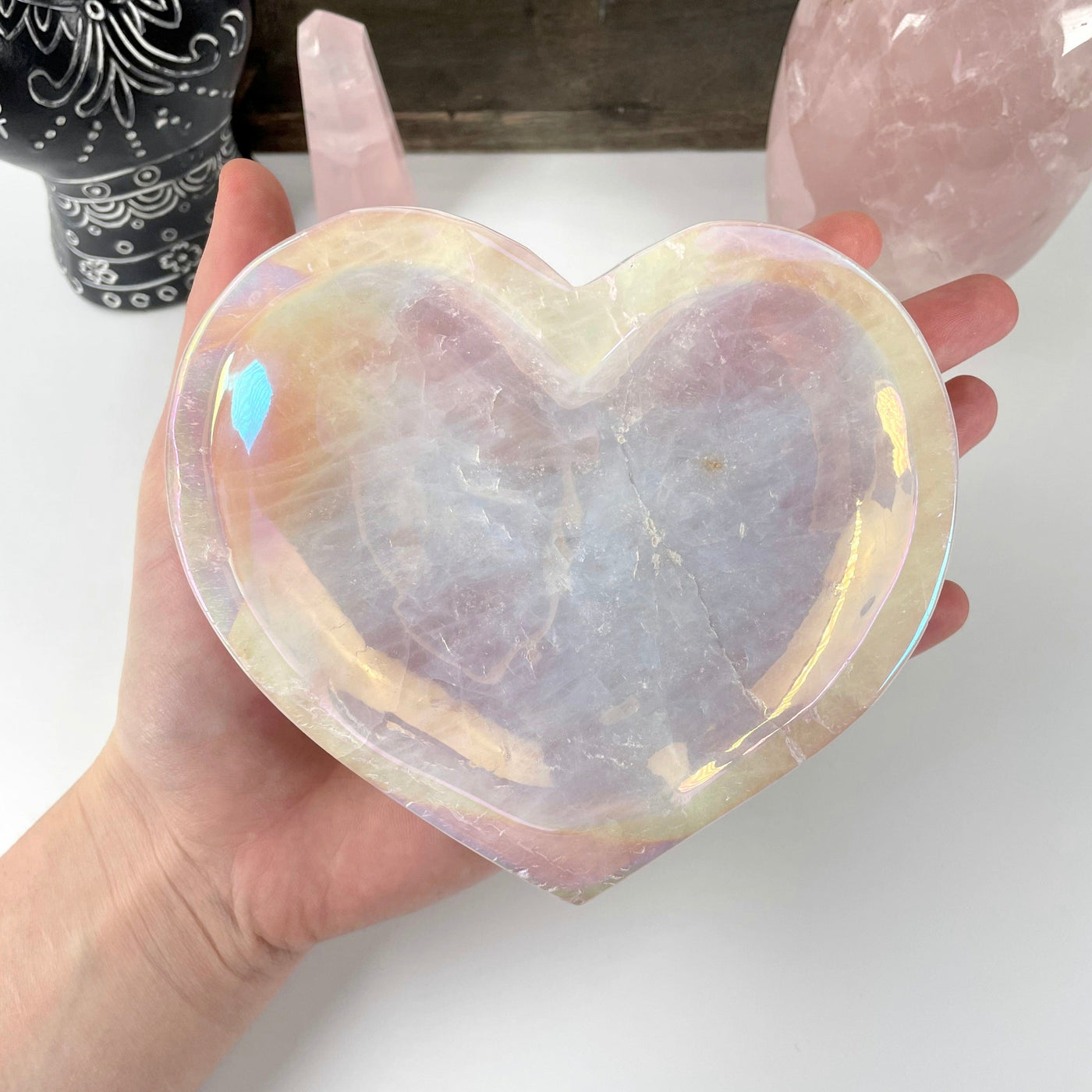 angel aura rose quartz heart bowl in hand for size reference