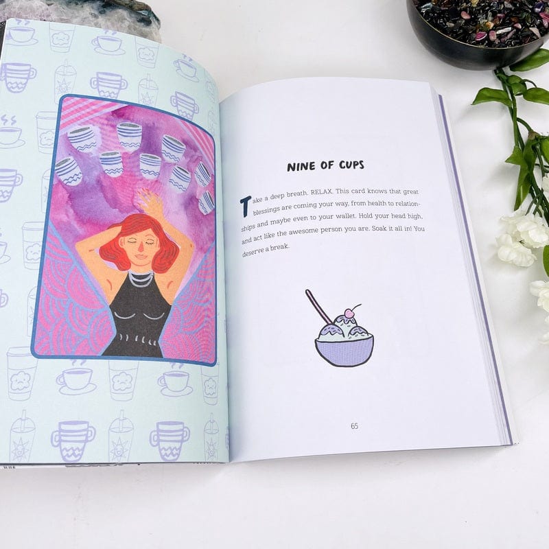 inside of the book showing explanation of tarot cards