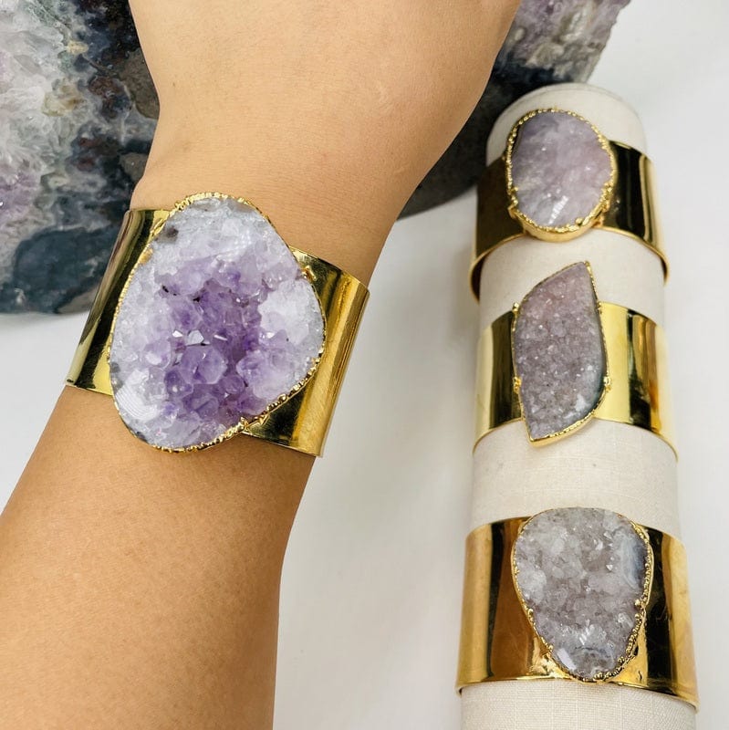 cuff bracelet with an amethyst drusy center on wrist for size reference 