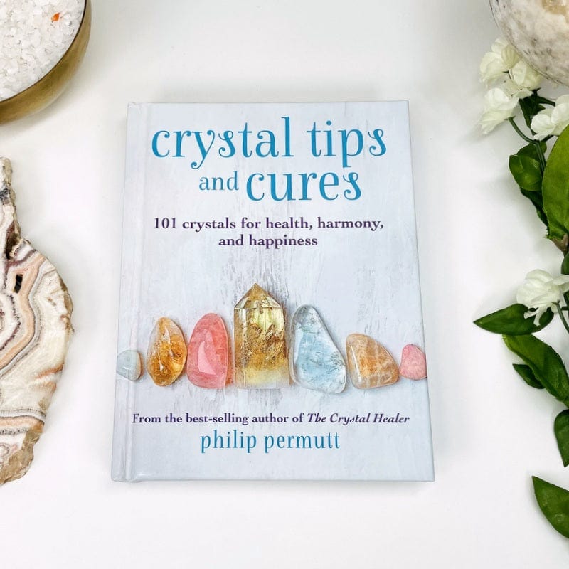 front cover of the book showing multiple crystals that are for health harmony and happiness 