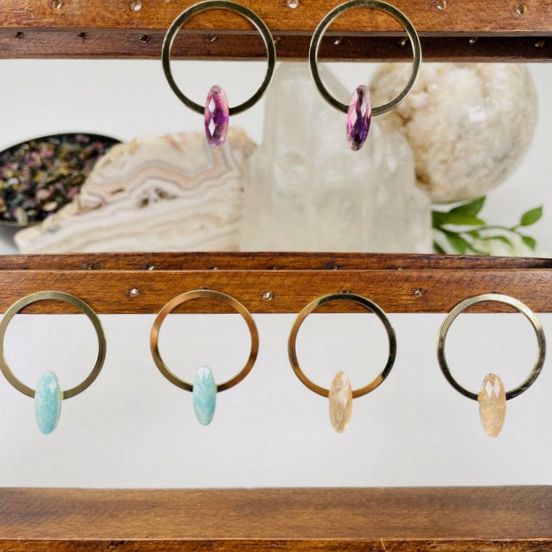 earrings displayed to show the differences in the gemstone types 