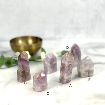 Seven Minerals Polished Point from A to F