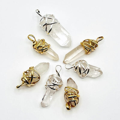 multiple pendants displayed to show the differences on the crystal point sizes 