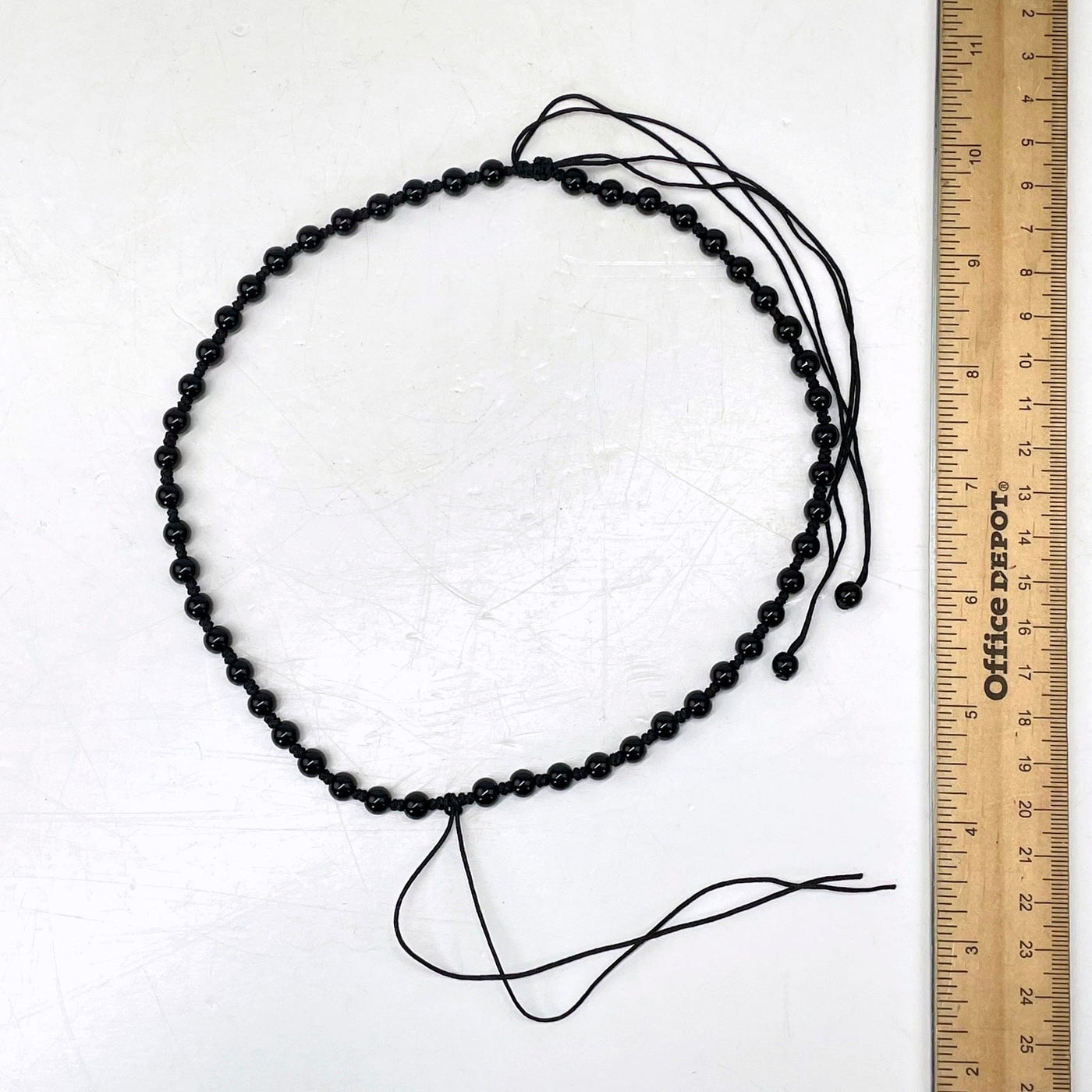 shortest necklace length with ruler for size reference