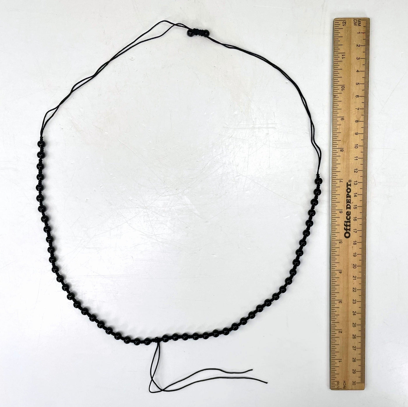longest necklace length with ruler for size reference