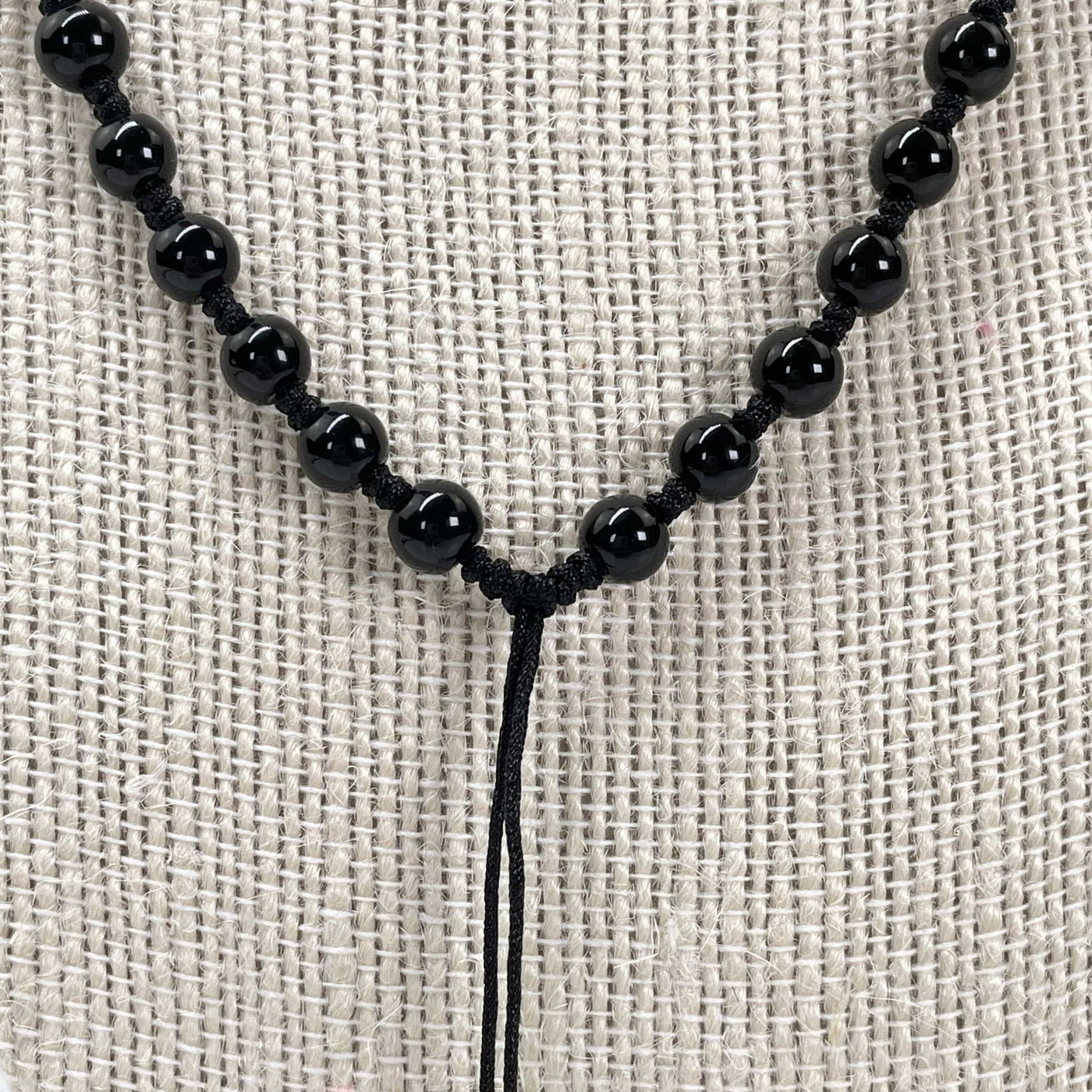 close up of center string without pendant